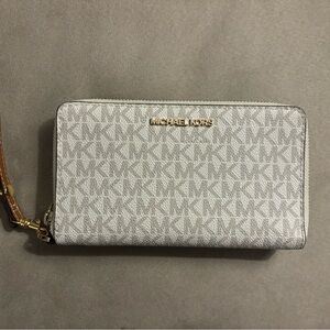 Michael Kors white and brown wristlet